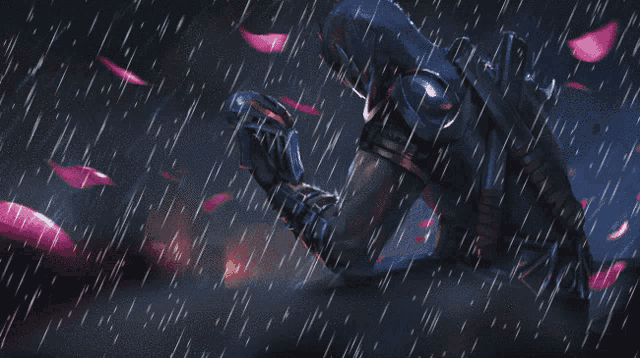 a man is standing in the rain with pink petals flying in the background