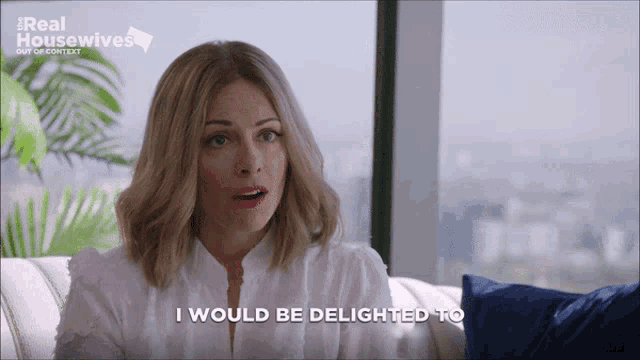 a woman sitting on a couch with the words " i would be delighted to " written below her