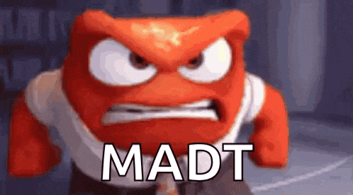 an angry cartoon character with the words `` mad '' written on it .