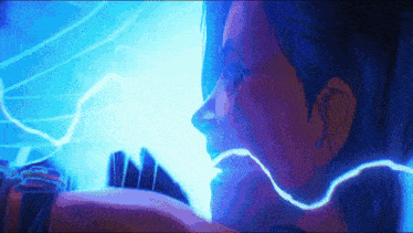 a close up of a person 's face with a blue lightning bolt coming from their hand .