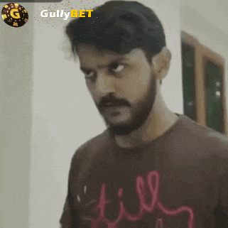 a man with a beard is wearing a shirt that says till