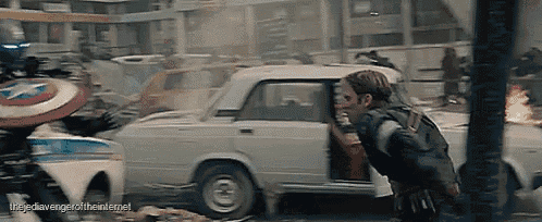 captain america is getting out of a car in a scene from the movie avengers