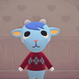 a blue goat wearing a red sweater with a heart above his head