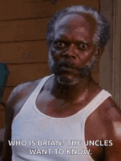 a man with a beard is wearing a white tank top and saying `` who is brian ? the uncles want to know .