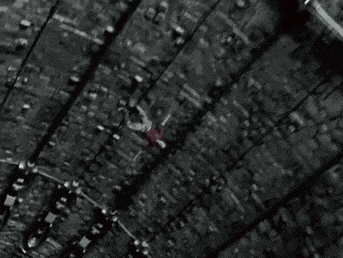 a black and white photo of a zipper on a black cloth