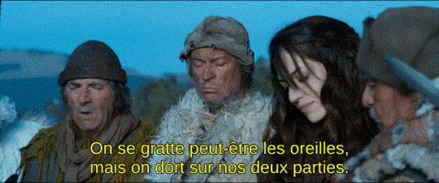 a group of people standing next to each other with the words " on se gratte peut être les oreilles "