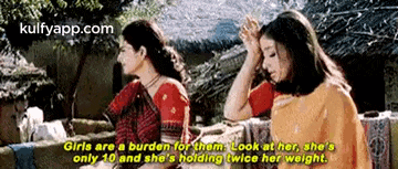 two women are standing next to each other and one of them says girls are a burden for them