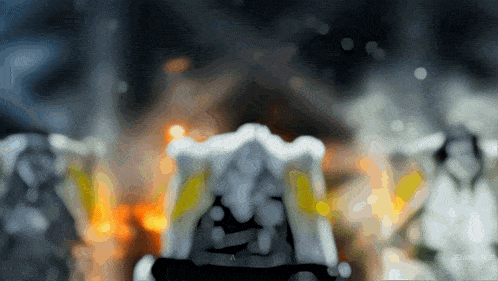 a blurred image of a person with the letters a on it