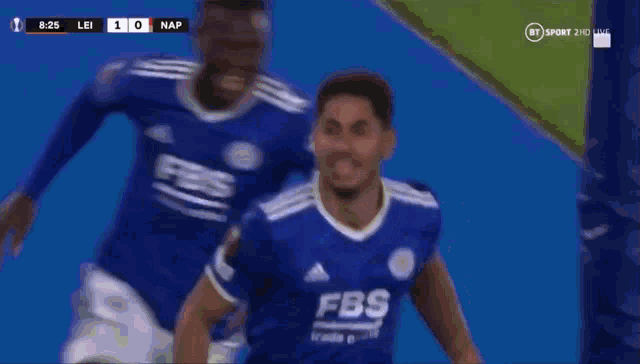 a soccer player wearing a blue jersey that says fbs