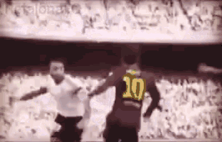 a soccer player with the number 10 on his jersey