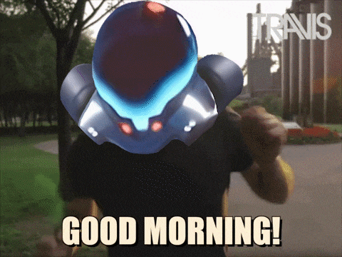 a man with a robot helmet on his head says " good morning "