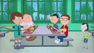a group of kids are sitting at a picnic table in a cafeteria