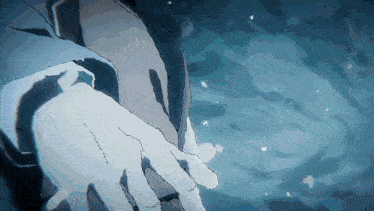 a close up of a person 's hand in the water