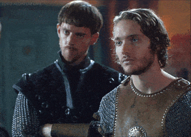 two men are standing next to each other and the words lord aldhelm gifs are on the bottom