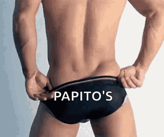 a shirtless man in black underwear with the words papito 's on the bottom of his underwear