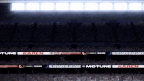a stadium with the word motune on a banner