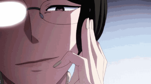a close up of a person 's face with glasses and yellow nails