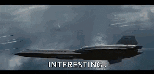 a fighter jet is flying through the air with the words `` interesting '' written on the bottom .