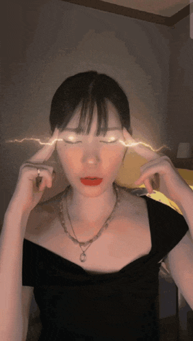 a woman with her eyes closed has lightning coming out of her head