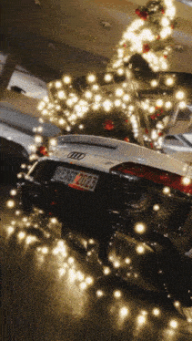 a car with a license plate that says me19t 2023