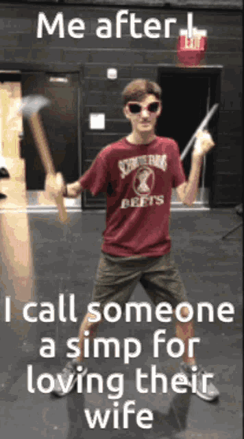 a man in a maroon shirt is holding two hammers