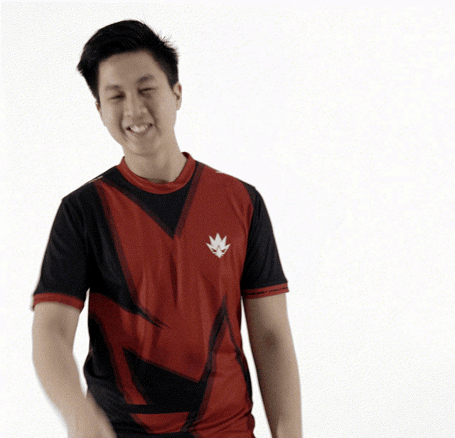 a man in a red and black shirt with a white leaf on the front