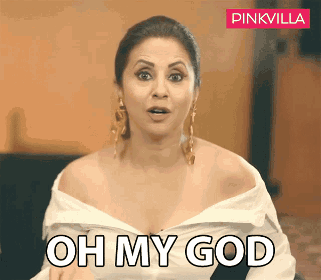 a woman says oh my god in front of a pink villa logo