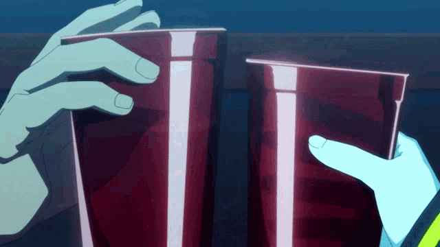 a person is holding a red cup in their right hand and another person is holding a red cup in their left hand