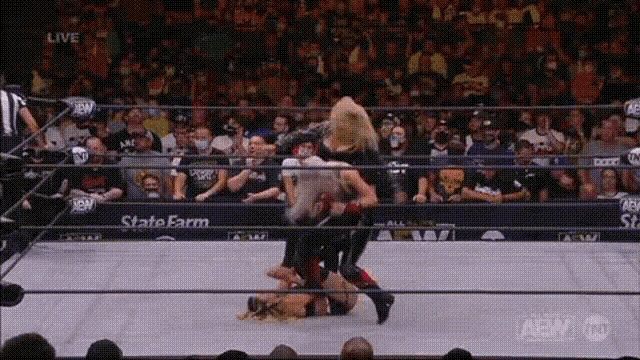 a wrestling match is being broadcasted live on a network called aew