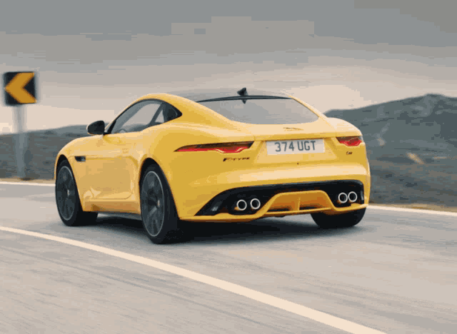a yellow car with the license plate 374 ugt