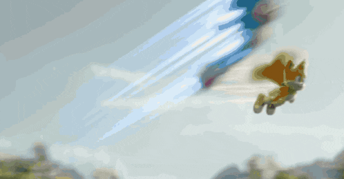 a person in a blue jacket is flying through a mountainous valley