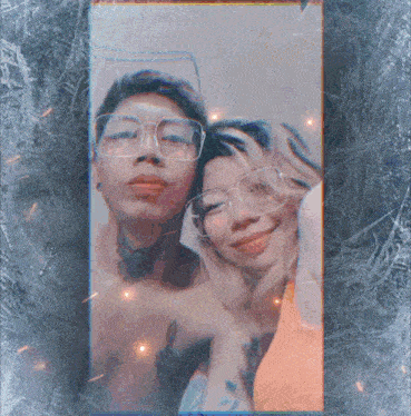 a man and a woman are posing for a picture with glasses on