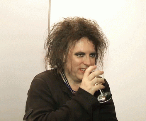 Robert Smith The Cure GIF - Robert Smith The Cure Drinking GIFs