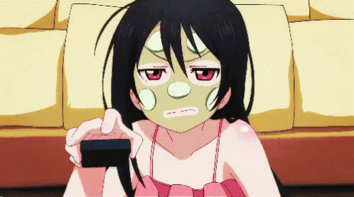 a girl with a mask on her face is holding a remote control