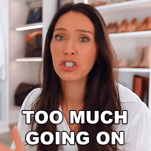 a woman says " too much going on " in front of a closet full of shoes