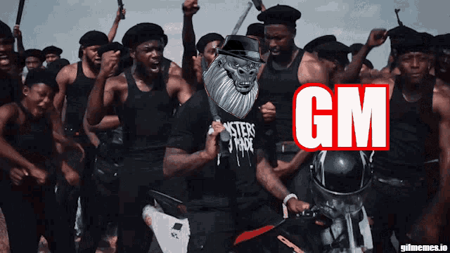 a group of men are standing in front of a sign that says gm on it