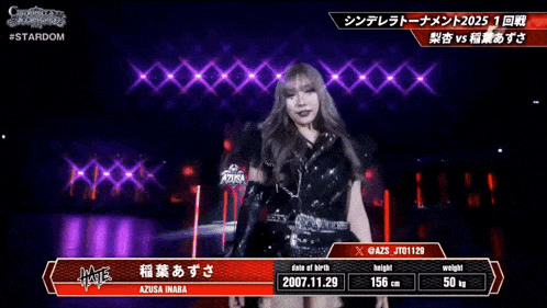 a female wrestler named azusa inaba stands on stage