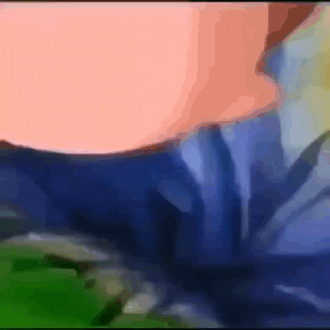 a blurry picture of a person 's butt with a blue shirt on