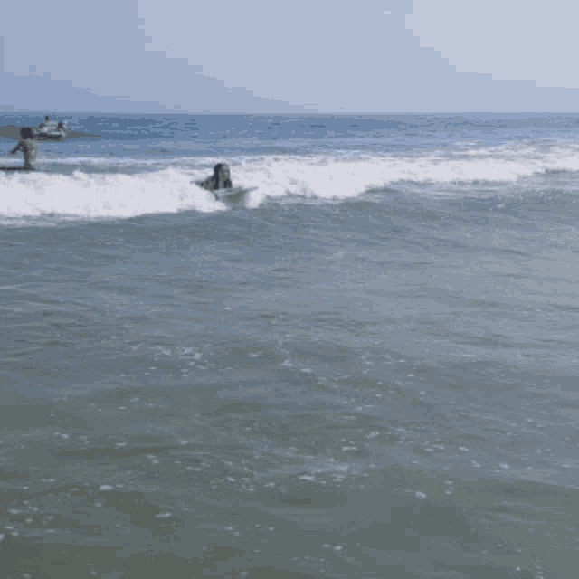 a person on a surfboard in the ocean