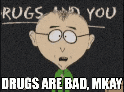 a cartoon character is standing in front of a blackboard with the words drugs are bad mkay written on it .