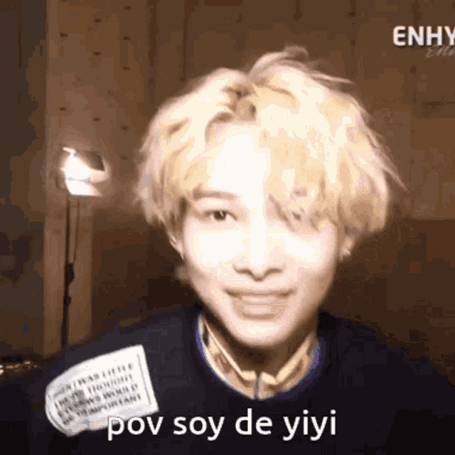 a close up of a person 's face with the words pov soy de yiyi on the bottom