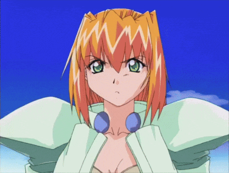 a girl with orange hair and green eyes is wearing a green jacket
