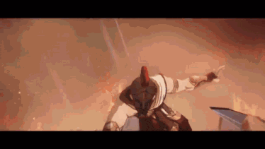 a man in a helmet is flying through the air .