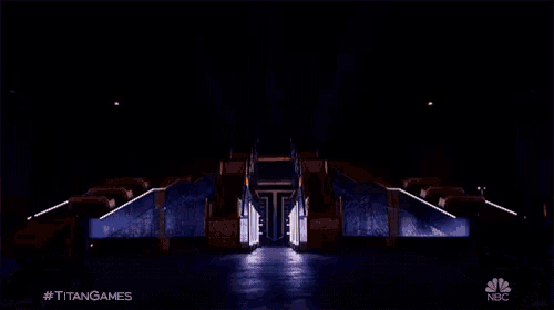 a nbc advertisement for titan games shows a staircase with a light coming out of it