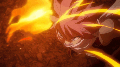 a close up of a person 's face with fire coming out of their hair