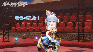 a girl in a fox costume is standing on a stage with a sign that says legend of polka on it