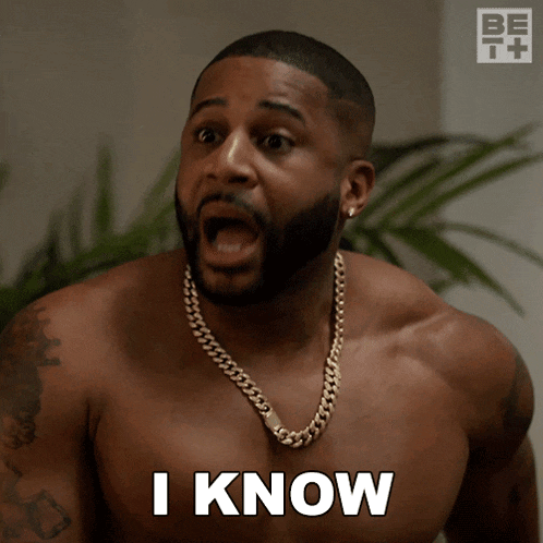 a shirtless man wearing a gold chain says " i know "