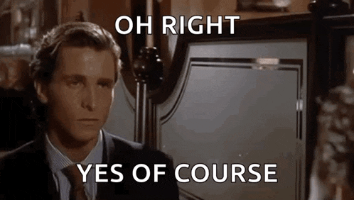 a man in a suit and tie is sitting in front of a bed with the words `` oh right yes of course '' written on it .