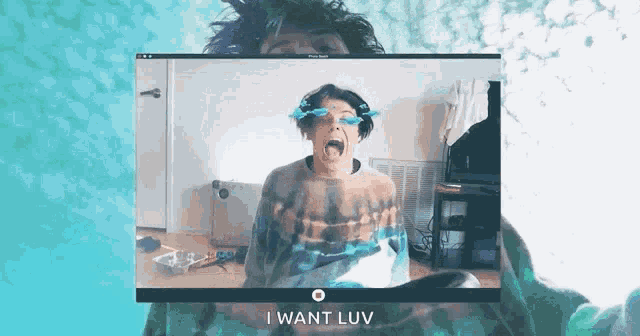 a man with purple hair is screaming in a video call .