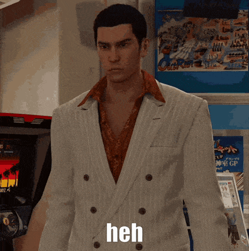 a man in a suit is standing in front of an arcade machine and the word heh is on his chest
